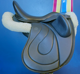 17" DMK Pinnacle Dressage Saddle. Flat Tree. High thigh, High profile blocks. Rent, Buy Demo, or Purchase New only at Delfina Saddlery.