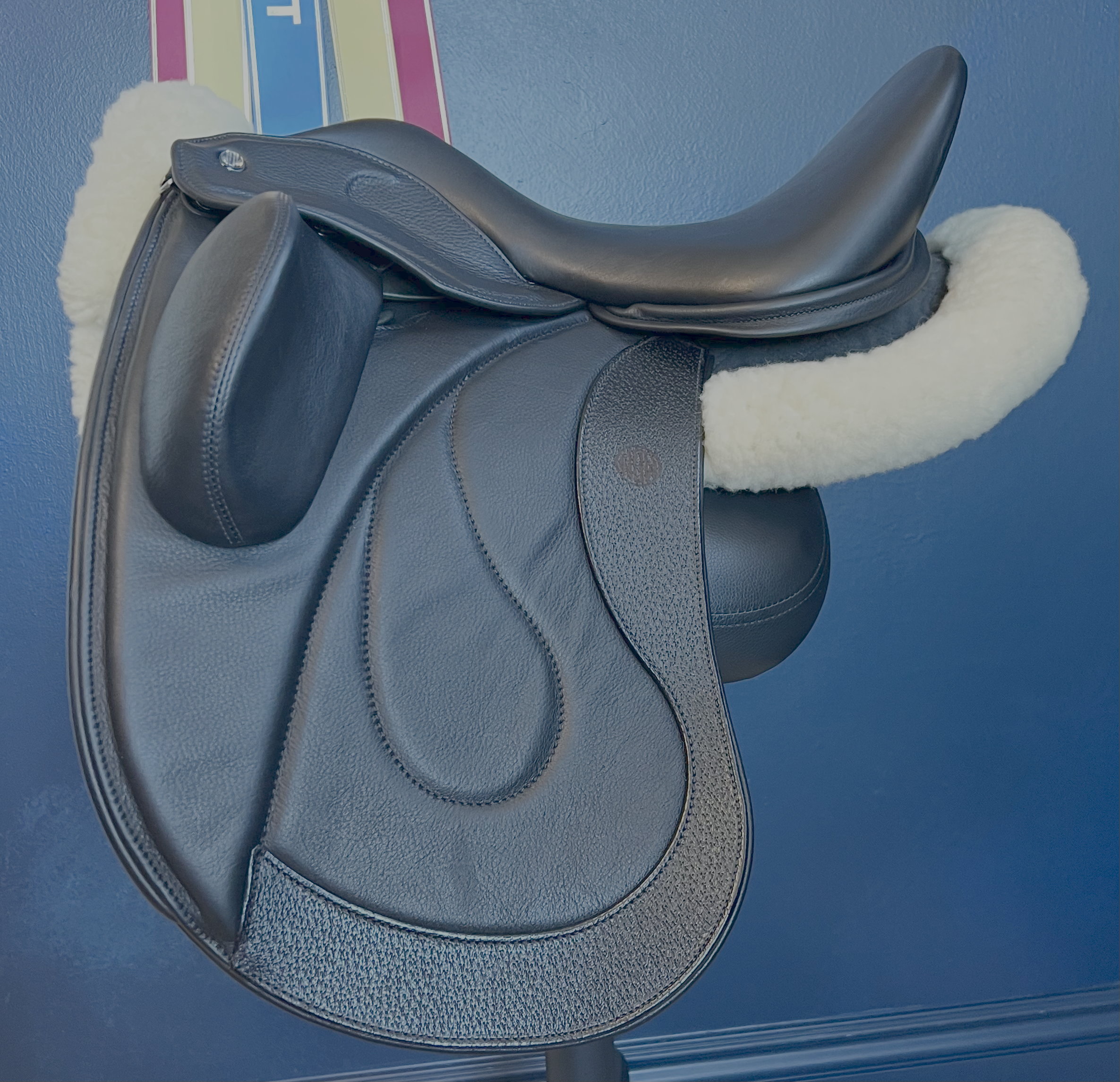 17" WOW Pinnacle Dressage Saddle Semi-Curved Tree black panel leather butt wear strip high thigh high profile blocks. Buy demo stock, order new, or rent weekly, only at Delfina Saddlery.