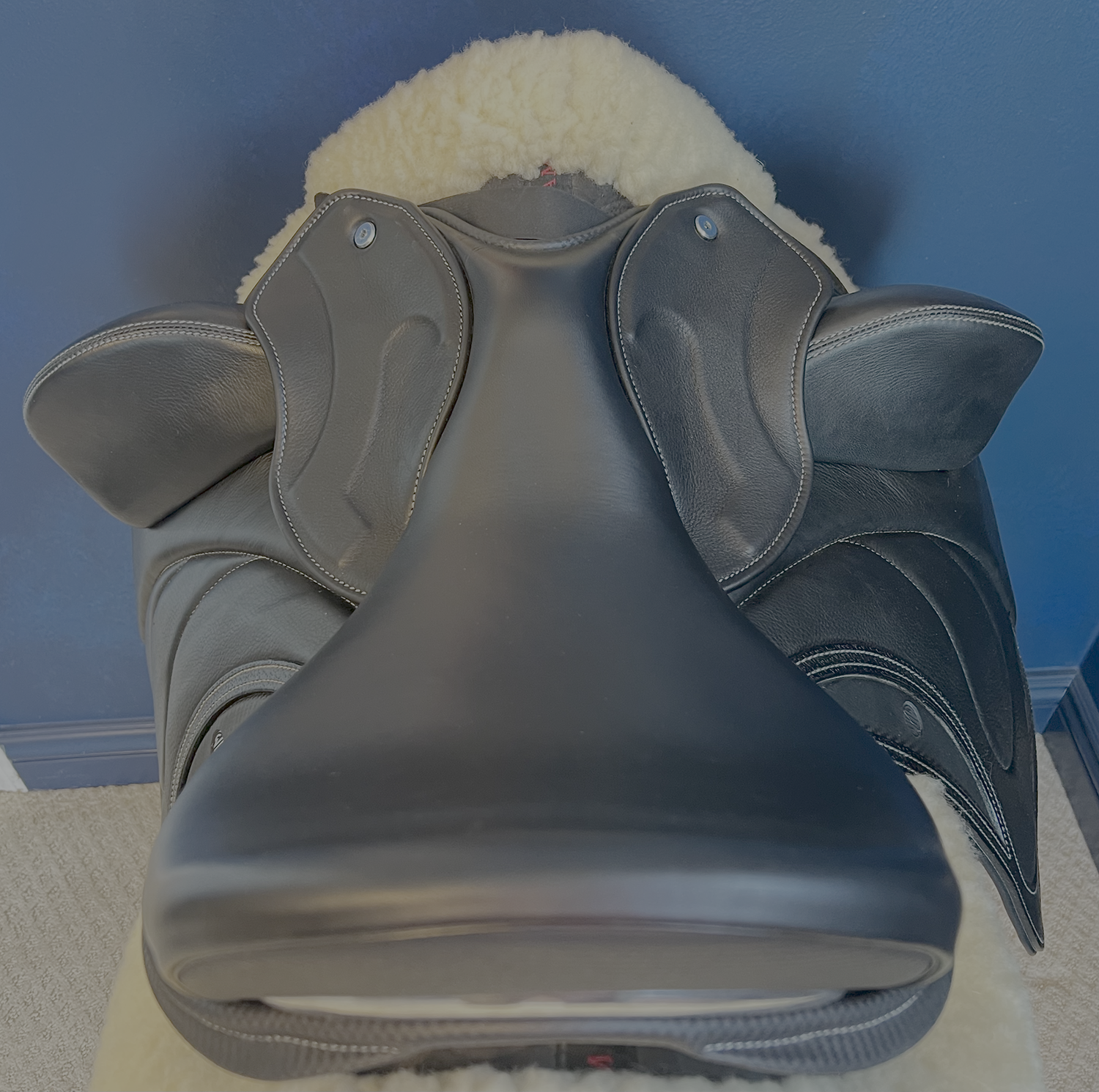 17" DMK Pinnacle Dressage Saddle with carbon fiber flap inlay & cantle infill, and carbon fiber seat facings. Curved Tree. High thigh, high profile blocks. Rent, Buy Demo, or Purchase New at Delfina Saddlery