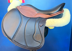 17" DMK Peak Show Jumping Saddle. Semi-curved Tree. Forward Cut flap. Fixed hi-wedge block. Rent, Buy Demo, or Purchase New only at Delfina Saddlery.