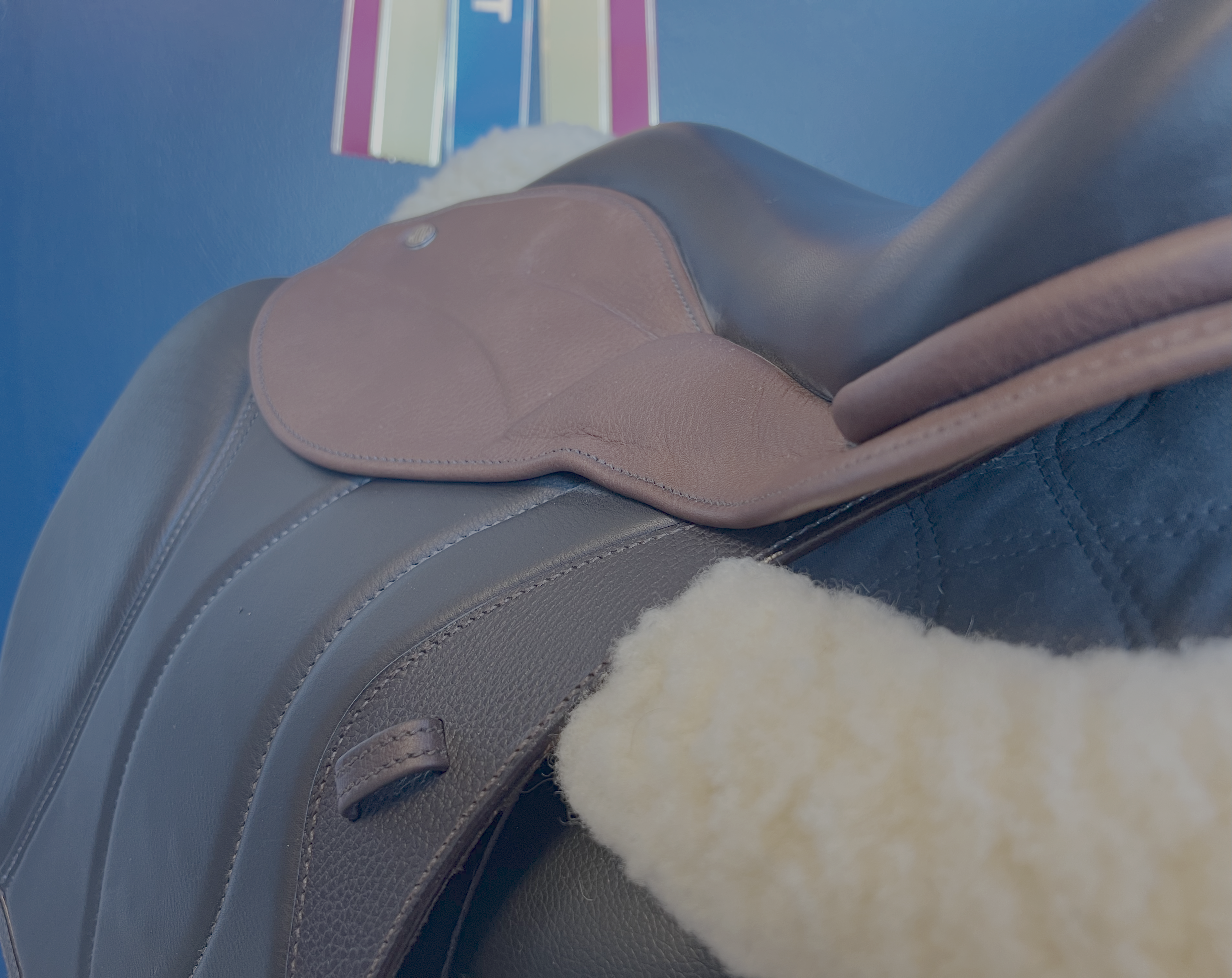 17" DMK Peak Show Jumping Saddle. Semi-curved Tree. Forward Cut flap. Fixed hi-wedge block. Rent, Buy Demo, or Purchase New only at Delfina Saddlery.