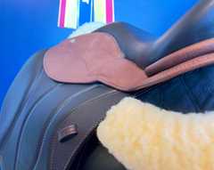 17" DMK Peak Show Jumping Saddle. Semi-curved Tree. Forward Cut flap. Fixed hi-wedge block. Rent, Buy Demo, or Purchase New only at Delfina Saddlery.