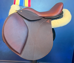 17" WOW DMK Show Jumping Dual-Flap Saddle. Semi-Curved Tree. Forward Cut flap. Movable knee block. Rent, Buy Demo, or Purchase New only at Delfina Saddlery.
