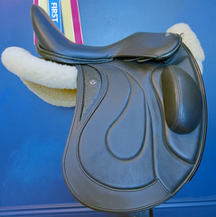 17" Custom Equitana Dressage Saddle with floral stamped leather infills, cantle, and facings. Semi-Curved Tree. Low thigh, Low profile blocks. Rent, Buy Demo, or Purchase New only at Delfina Saddlery.