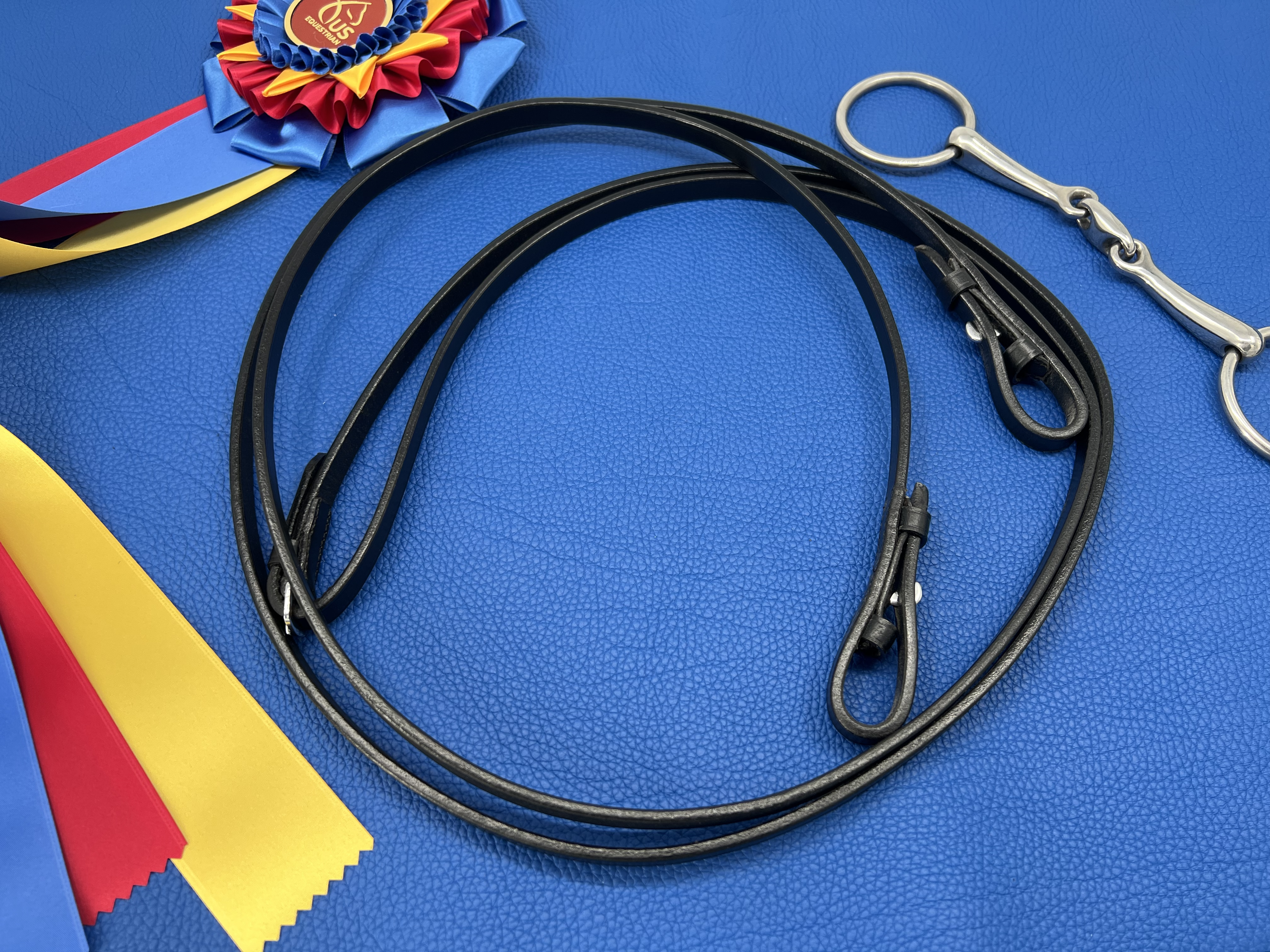 Delfina brand black, flat reins with hook stud ends for dressage, jumpers, pleasure, trail horses.
