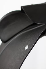 The Duskin Dressage Saddle features a high-thigh/high-profile fixed adjustable block designed after WOW's best-selling Equitana dressage flap