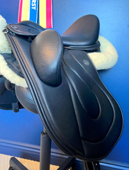 17" DMK Pinnacle Dressage Saddle.  Flat Tree. High thigh, High profile blocks. Rent, Buy Demo, or Purchase New only at Delfina Saddlery.