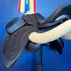 17" WOW Pinnacle Dressage Saddle Semi-Curved Tree black panel leather butt wear strip high thigh high profile blocks. Buy demo stock, order new, or rent weekly, only at Delfina Saddlery.