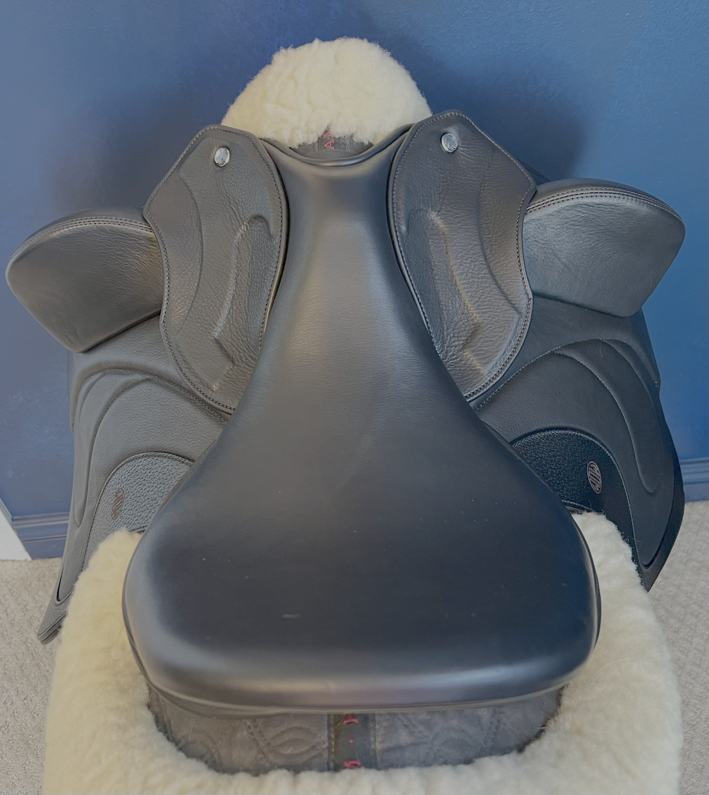 17" WOW Pinnacle Dressage Saddle Semi-Curved Tree black panel leather butt wear strip high thigh high profile blocks. Buy demo stock, order new, or rent weekly, only at Delfina Saddlery.