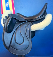 17" DMK Pinnacle Dressage Saddle with carbon fiber flap inlay & cantle infill, and carbon fiber seat facings. Curved Tree. High thigh, high profile blocks. Rent, Buy Demo, or Purchase New at Delfina Saddlery