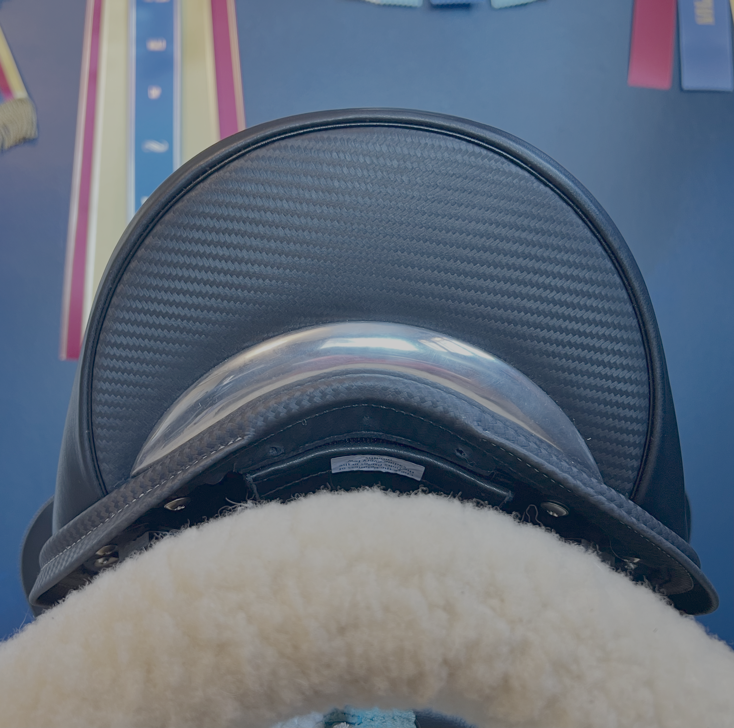 17" DMK Pinnacle Dressage Saddle with carbon fiber flap inlay & cantle infill, and carbon fiber seat facings. Curved Tree. High thigh, high profile blocks. Rent, Buy Demo, or Purchase New at Delfina Saddlery