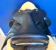 17" Custom Equitana Dressage Saddle with floral stamped leather infills, cantle, and facings. Semi-Curved Tree. Low thigh, Low profile blocks. Rent, Buy Demo, or Purchase New only at Delfina Saddlery.