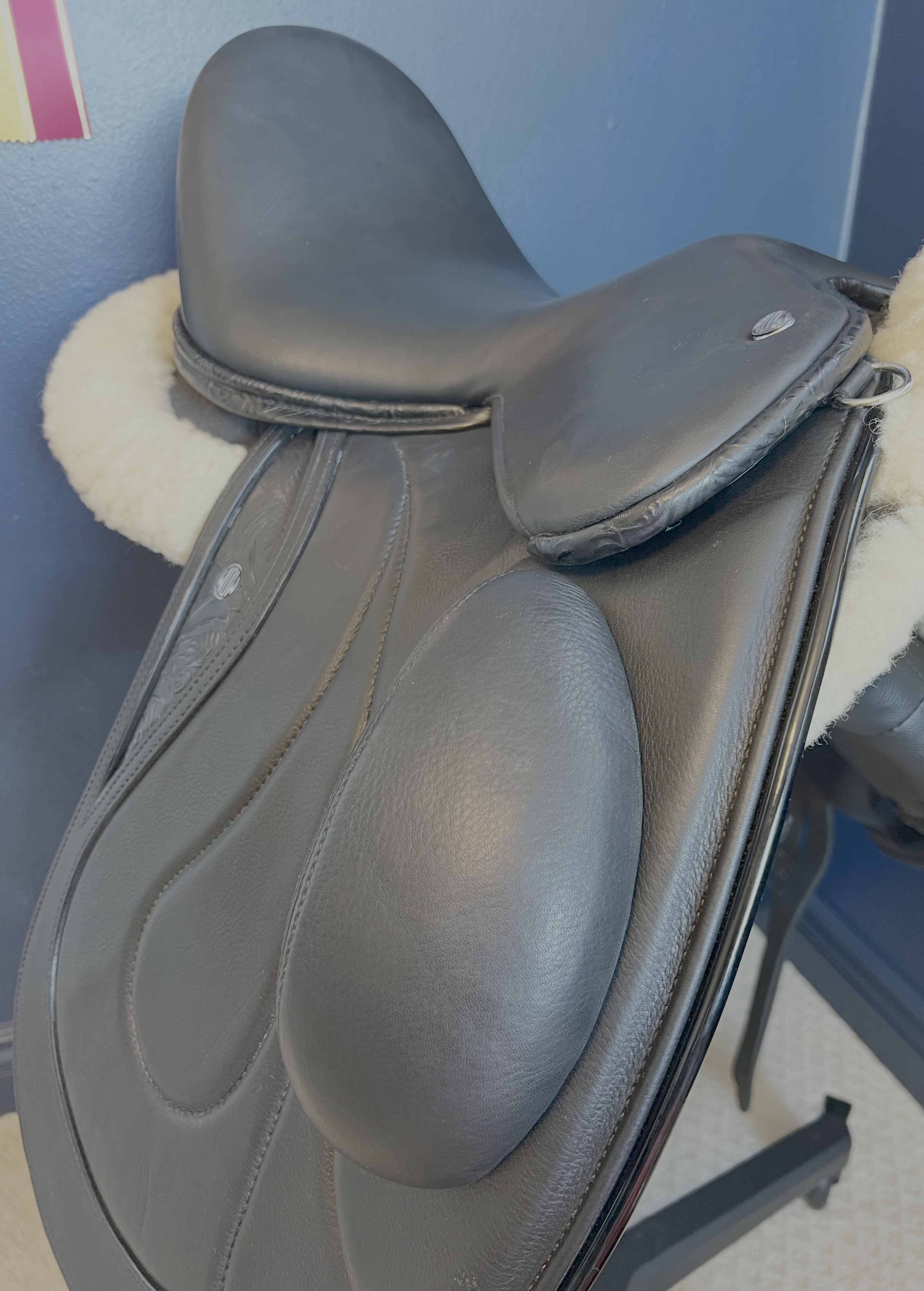 17" Custom Equitana Dressage Saddle with floral stamped leather infills, cantle, and facings. Semi-Curved Tree. Low thigh, Low profile blocks. Rent, Buy Demo, or Purchase New only at Delfina Saddlery.