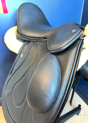 17" Custom Equitana Dressage Saddle with floral stamped leather infills, cantle, and facings. Semi-Curved Tree. Low thigh, Low profile blocks. Rent, Buy Demo, or Purchase New only at Delfina Saddlery.