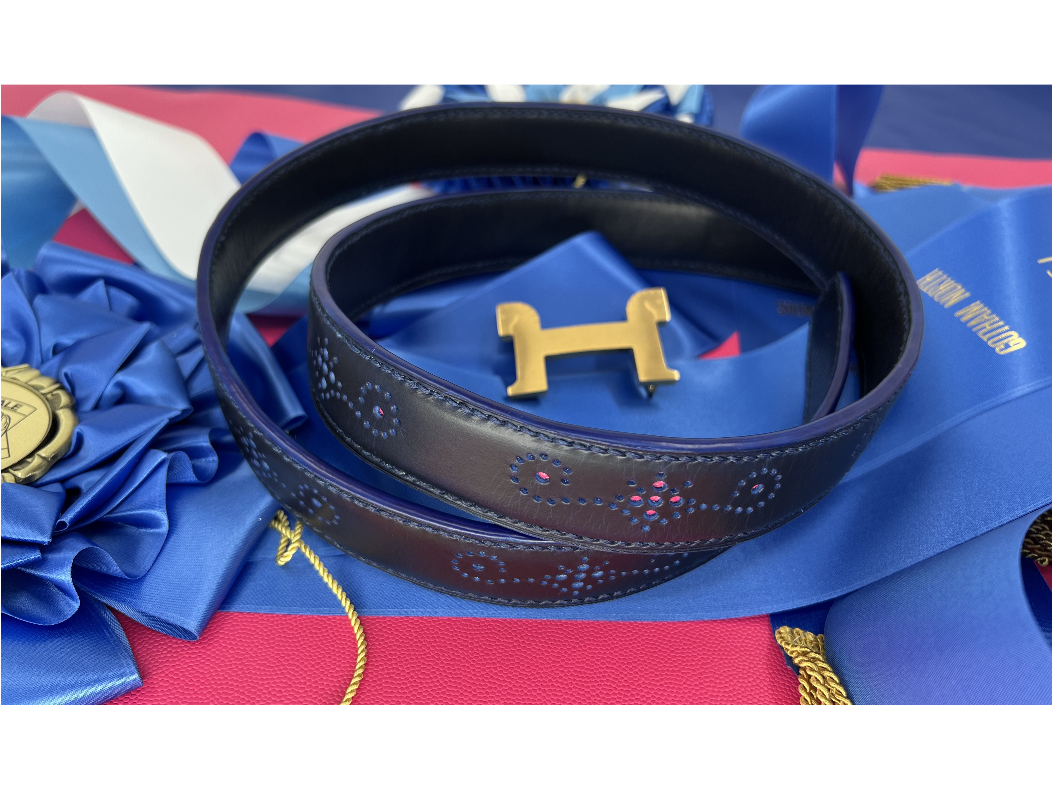 Custom belt made of ink blue horween leather and pink chanel caviar with brogue detailing